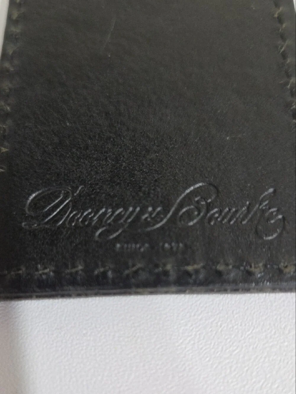 Dooney & Bourke Black Leather Tag with Embossed Logo